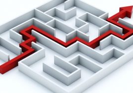 Red path across labyrinth isolated on white